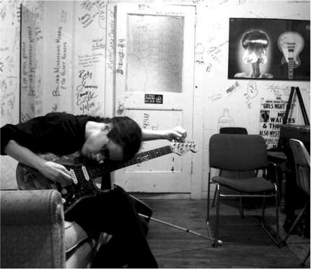 conrad oberg backstage at ground zero blues club in clarksdale, Mississippi